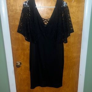 Black cocktail dress with a black lace cape